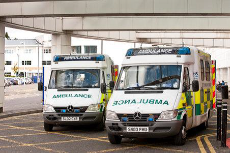 Two ambulances outside a hospital