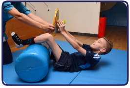 Physiotherapist working with a child